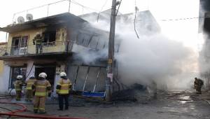 Tüpten çıkan yangın, binayı kullanılamaz hale getirdi