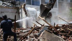  METRUK BINALAR YIKILDI