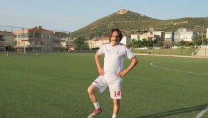 40 yıllık teknik adam torunlarıyla sahada.