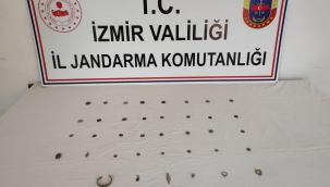 İzmir'de tarihi paraları satamadan yakalandı