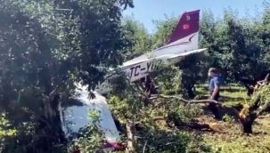 BURSA'DA EĞİTİM UÇAĞI BAHÇEYE İNİŞ YAPTI: 2 YARALI!