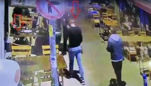 Gazetecinin telefonunu ceketiyle gizleyerek çaldı