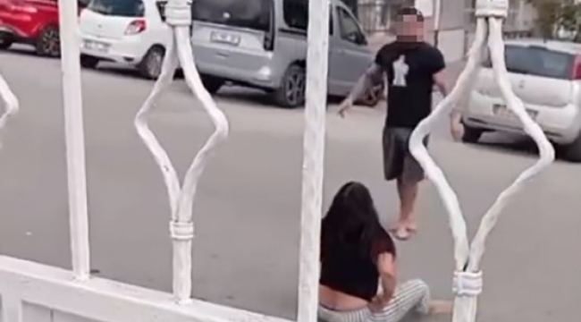 Sokak ortasında karısını dövdü, okuldaki çocuklar izledi